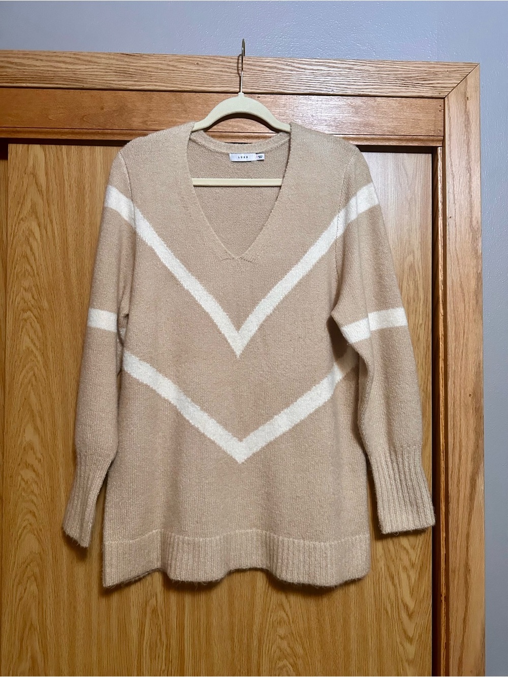 Nanamacs Boutique Beige V-Neck Sweater with White Chevron Stripes